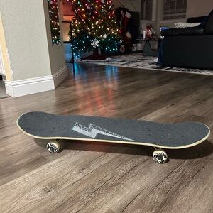 Black Skateboard with Graphic Design